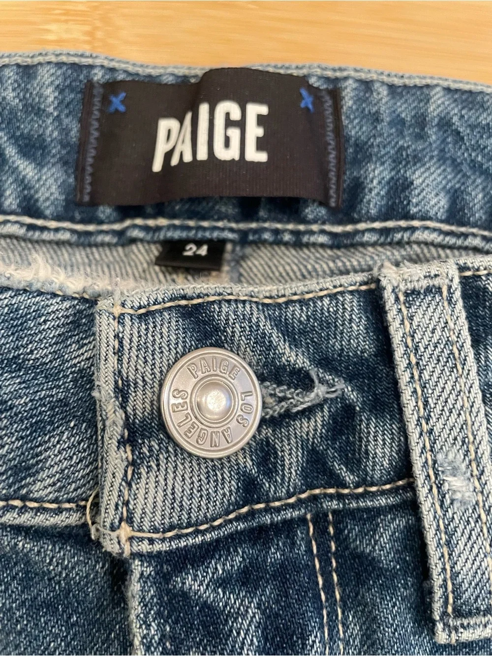 PAIGE High-Rise Flare Jeans in Medium Blue with Distressed Knees - Picture 5 of 9